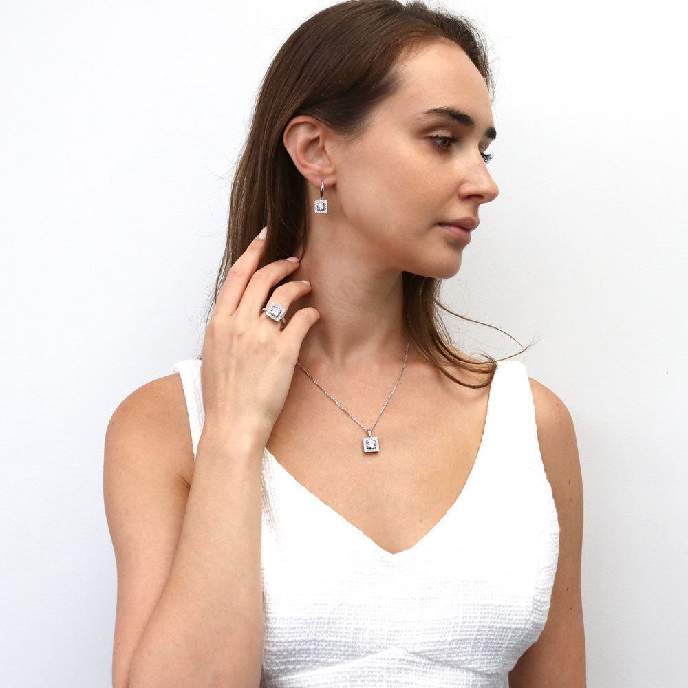 Model wearing Halo Round CZ Ring in Sterling Silver, 13 of 14
