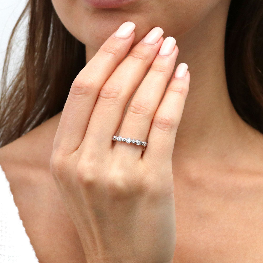 Model wearing Bubble Bezel Set CZ Eternity Ring in Sterling Silver, 2 of 11