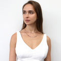 Model wearing Bead Paperclip Link Chain Necklace, 2 Piece, Rose Gold Flashed