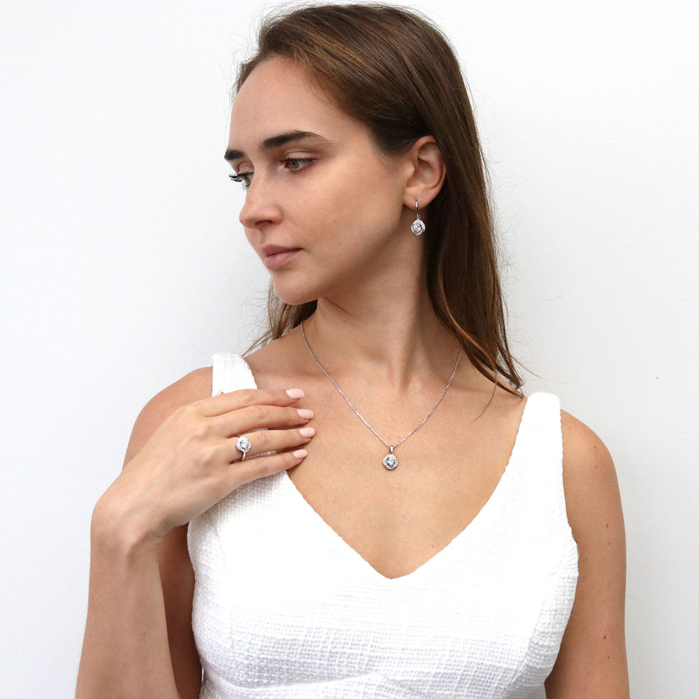 Model wearing Flower Woven Halo CZ Ring in Sterling Silver, 10 of 10