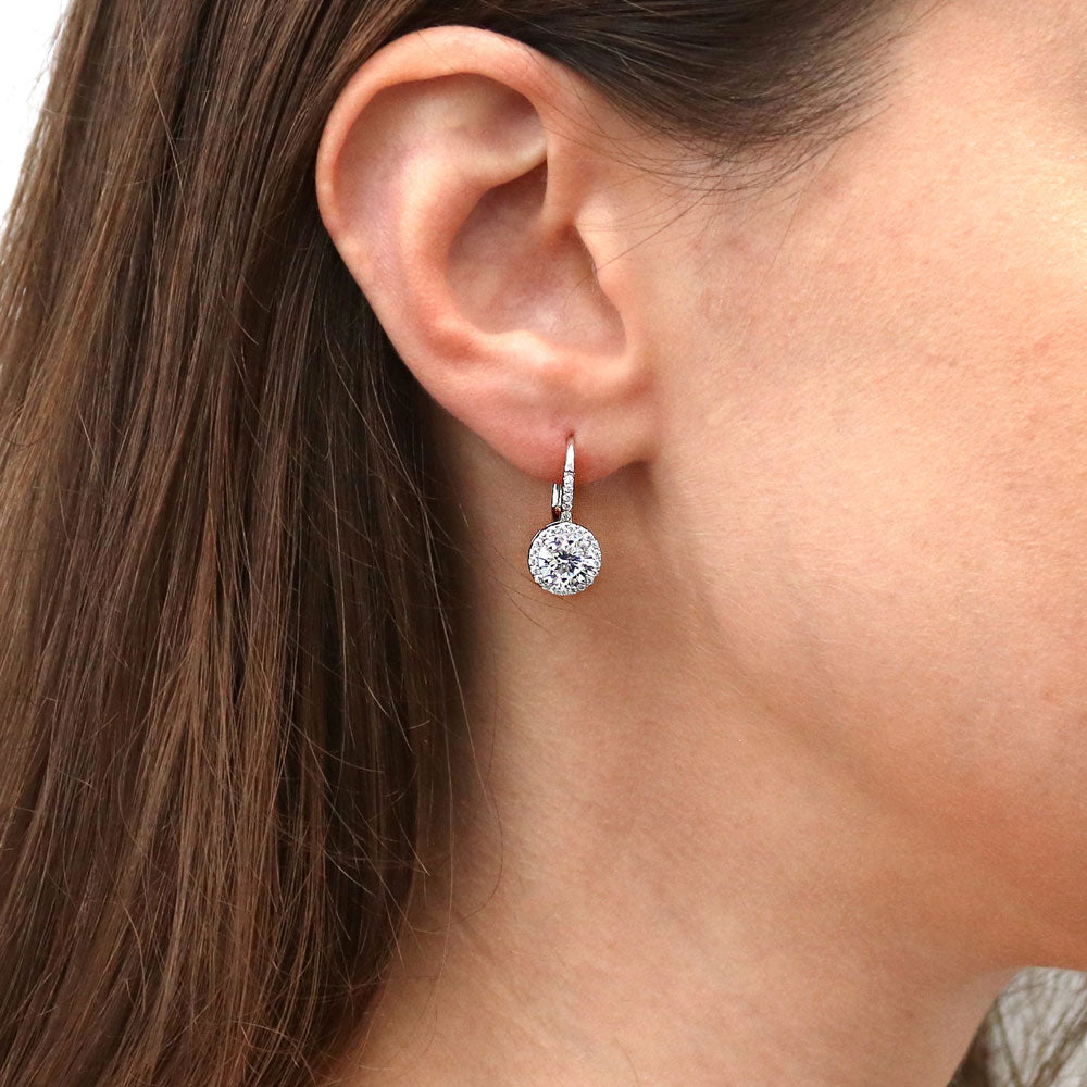 Model wearing Solitaire 2.5ct CZ Leverback Earrings in Sterling Silver, 2 of 4