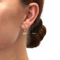 Model wearing Solitaire CZ Leverback Earrings in Gold Flashed Sterling Silver, 5mm