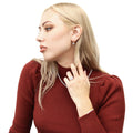 Model wearing Solitaire 4ct Cushion CZ Leverback Earrings in Sterling Silver, Yellow Gold Flashed