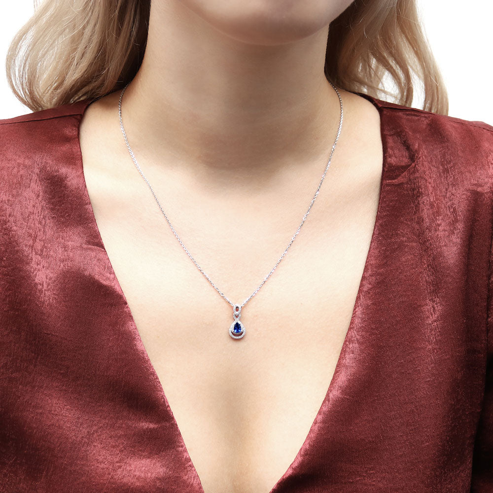 Model wearing Teardrop Sapphire-Blue CZ Necklace in Sterling Silver, 2 of 8
