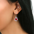 Model wearing Heart Flower CZ Fish Hook Earrings in Sterling Silver, Clear Color