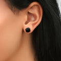 Model wearing Square CZ Stud Earrings in Sterling Silver, Blue Color