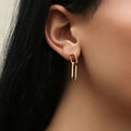 Model wearing Paperclip Interlocking Earrings in Sterling Silver, Yellow Gold Flashed