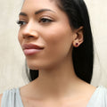 Model wearing Solitaire CZ Stud Earrings in Sterling Silver 2.5ct, Red Color