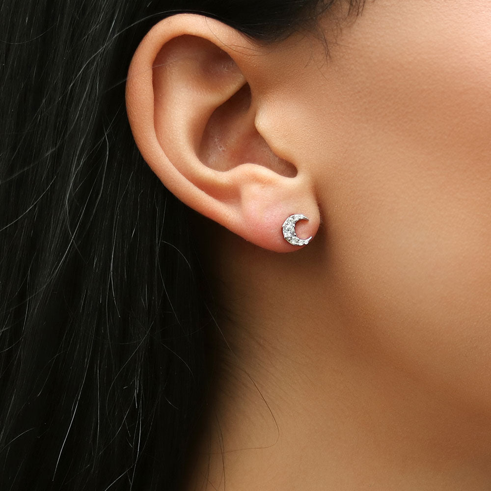 Model wearing Crescent Moon CZ Stud Earrings in Sterling Silver, 5 of 9