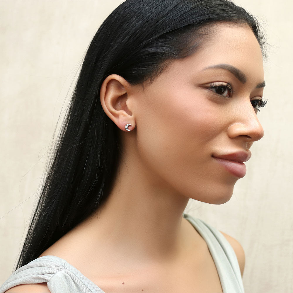 Model wearing Crescent Moon CZ Stud Earrings in Sterling Silver, 2 of 9