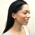 Model wearing Crescent Moon Stud Earrings in Sterling Silver, Yellow Gold Flashed