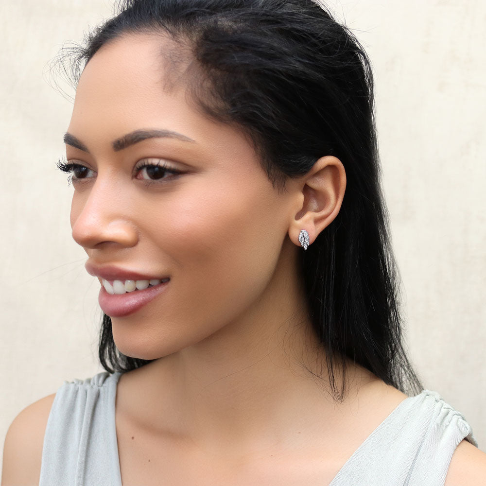 Model wearing Leaf CZ Stud Earrings in Sterling Silver, 3 of 5