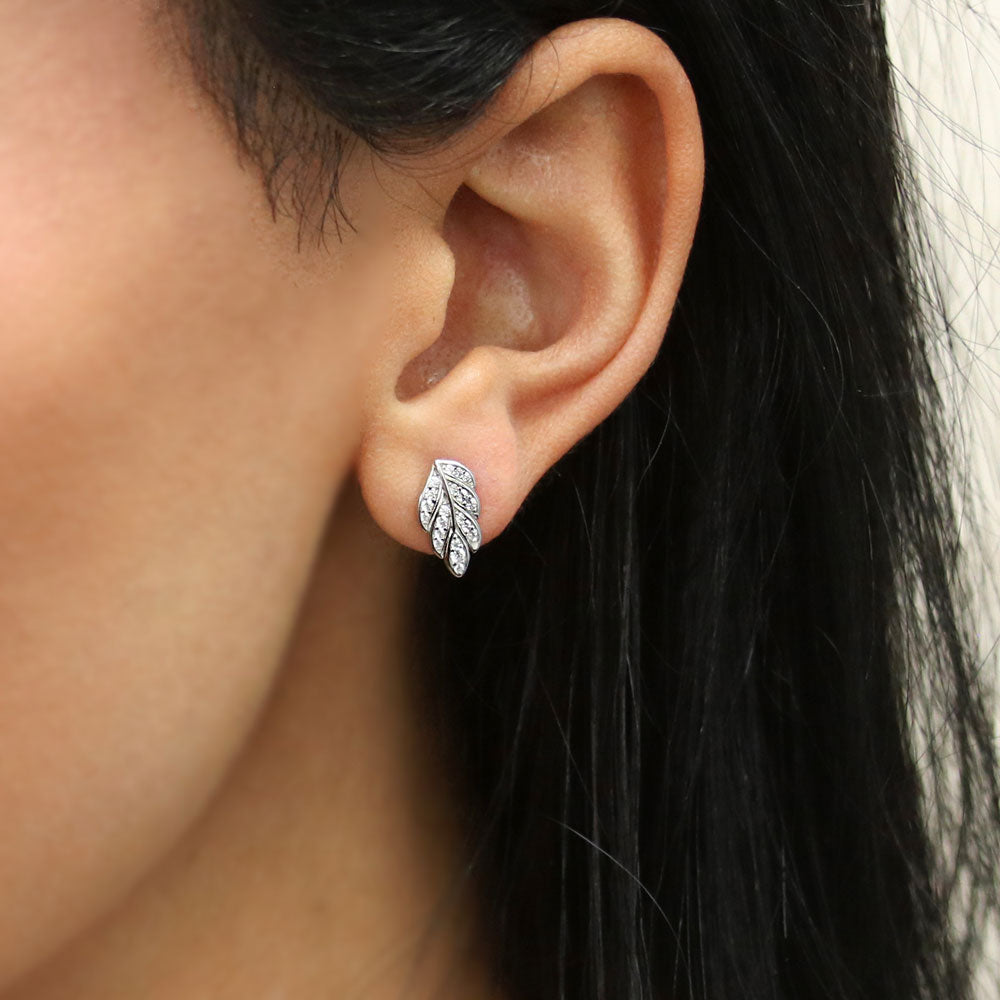 Model wearing Leaf CZ Stud Earrings in Sterling Silver, 2 of 5