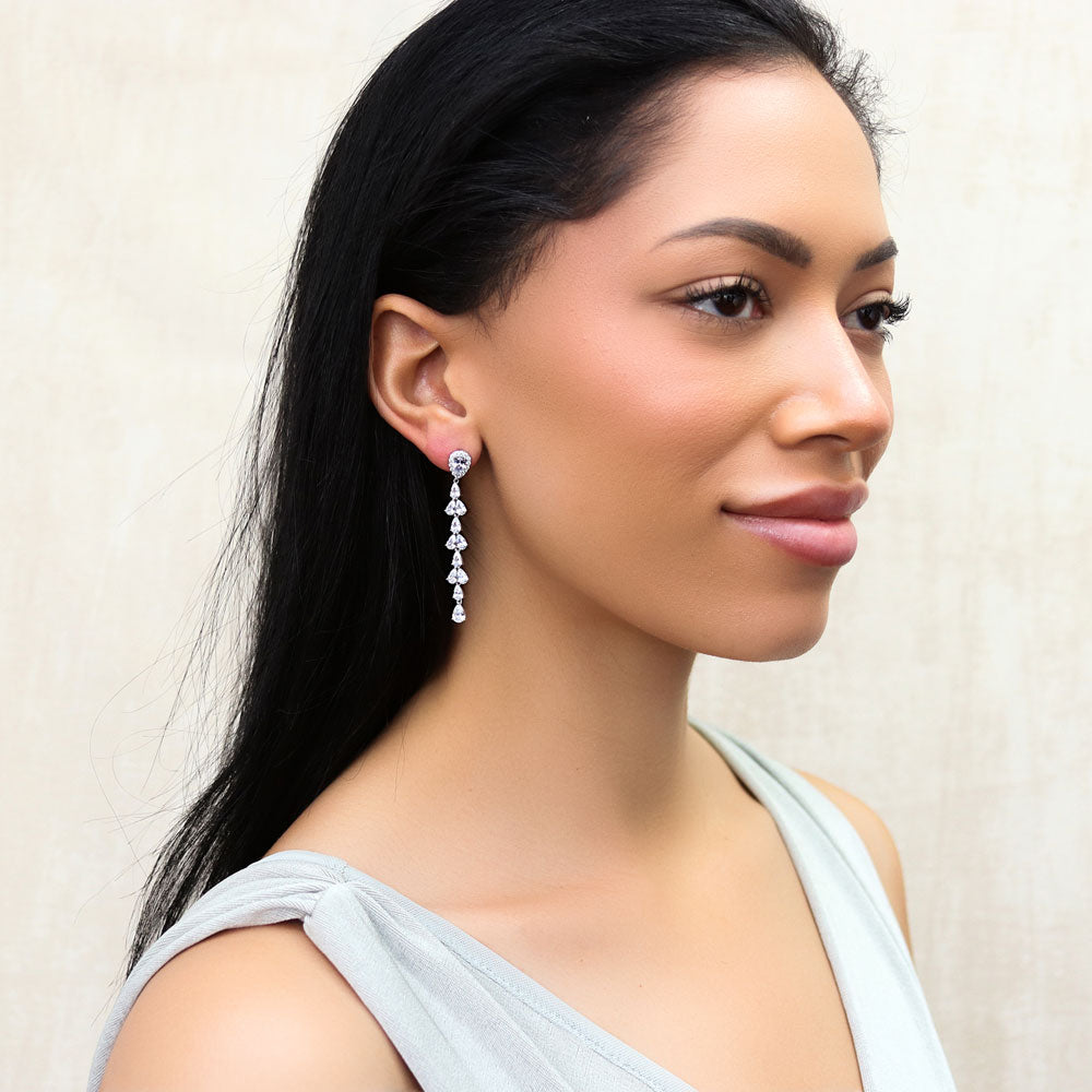 Model wearing Teardrop CZ Chandelier Earrings in Sterling Silver, 3 of 9