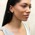 Model wearing Solitaire Bezel CZ Stud Earrings in Gold Flashed Sterling Silver, 8mm