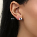 Model wearing Solitaire CZ Stud Earrings in Gold Flashed Sterling Silver, 8mm