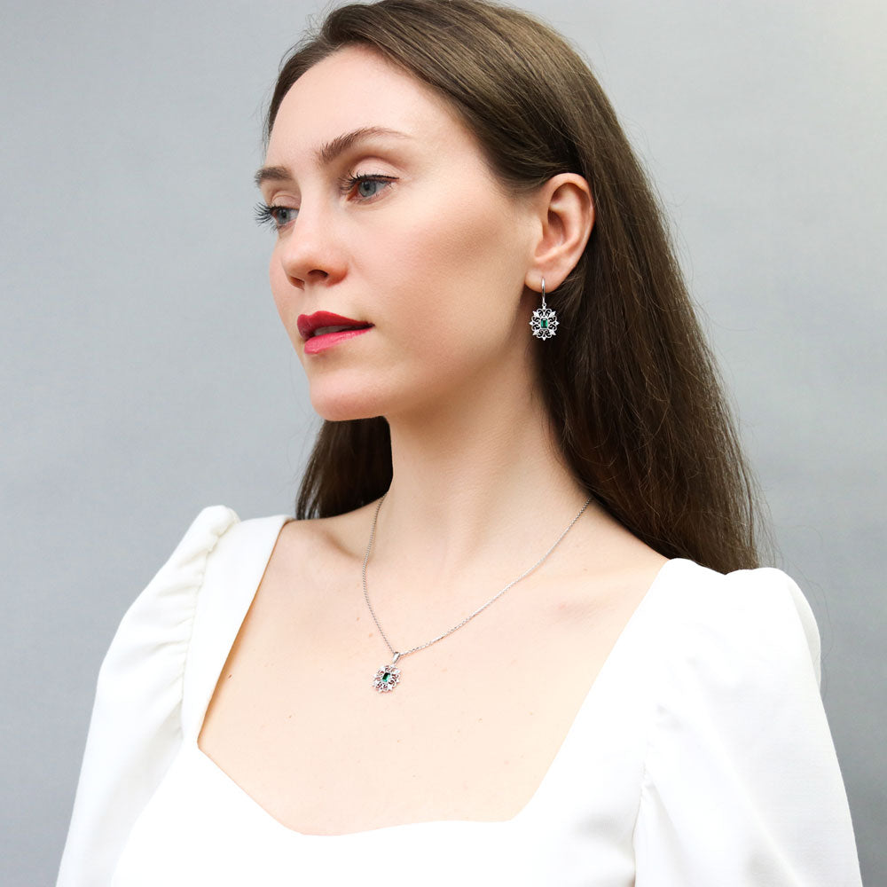 Model wearing Art Deco Filigree Green CZ Fish Hook Earrings in Sterling Silver, 5 of 7