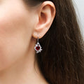 Model wearing Heart Flower CZ Fish Hook Earrings in Sterling Silver, Clear Color