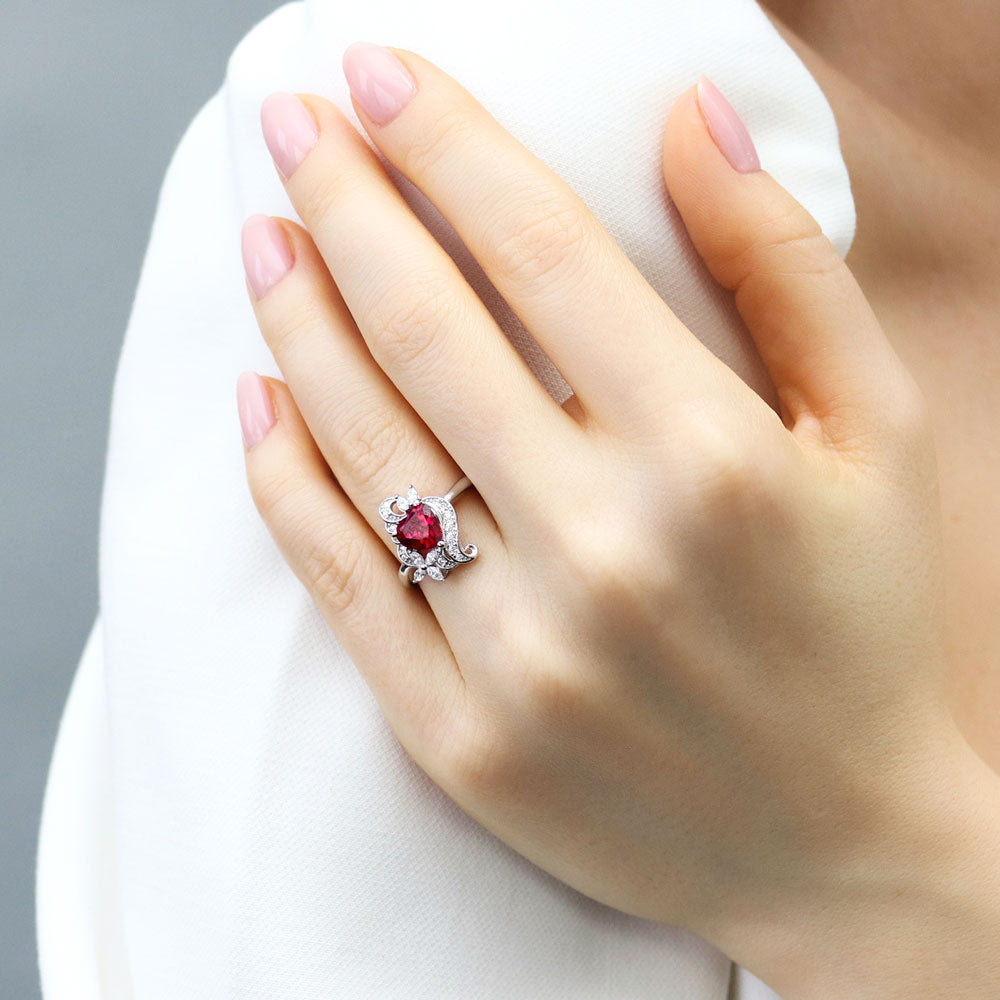 Model wearing Heart Flower Ruby-Red CZ Ring in Sterling Silver, 2 of 9