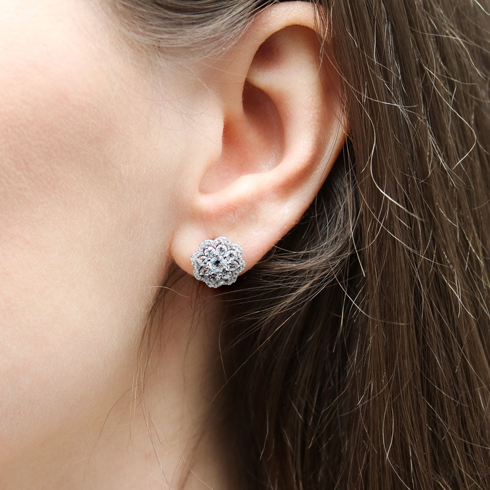 Model wearing Flower Halo CZ Stud Earrings in Sterling Silver, 2 of 7