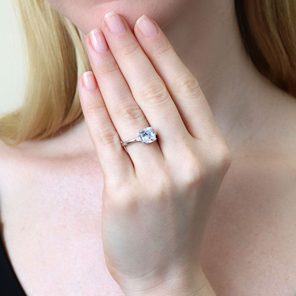 Model wearing 3-Stone 3ct Cushion CZ Ring in Sterling Silver, 2 of 8