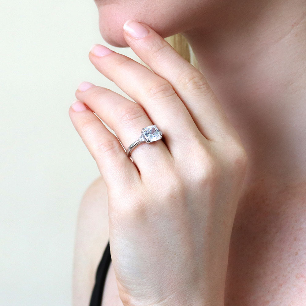 Model wearing 3-Stone 3ct Cushion CZ Ring in Sterling Silver, 7 of 8