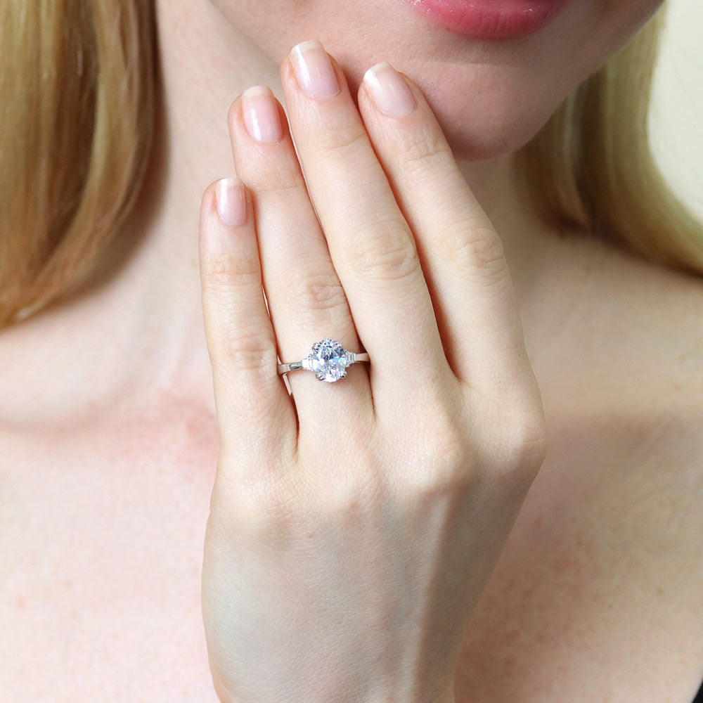 Model wearing 3-Stone 1.8ct Oval CZ Ring in Sterling Silver, 7 of 9