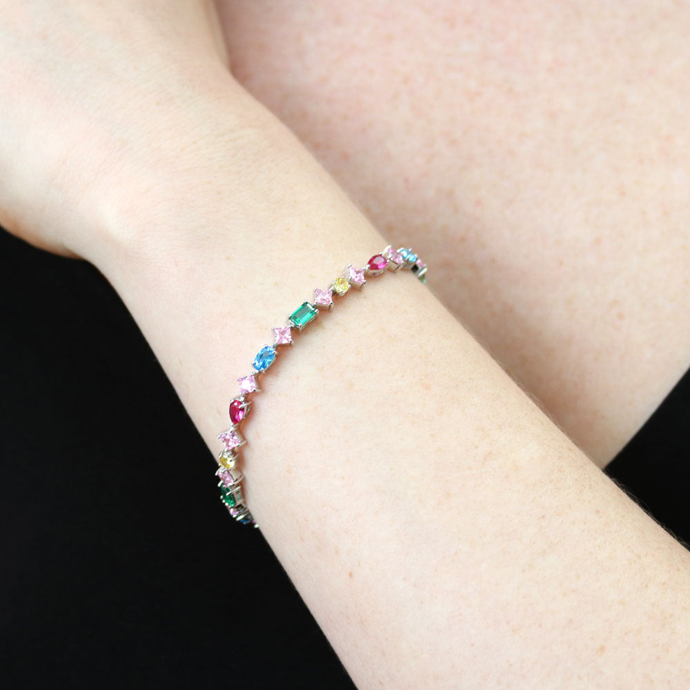 Model wearing Cluster Emerald-Green CZ Tennis Bracelet in Sterling Silver, 2 of 9