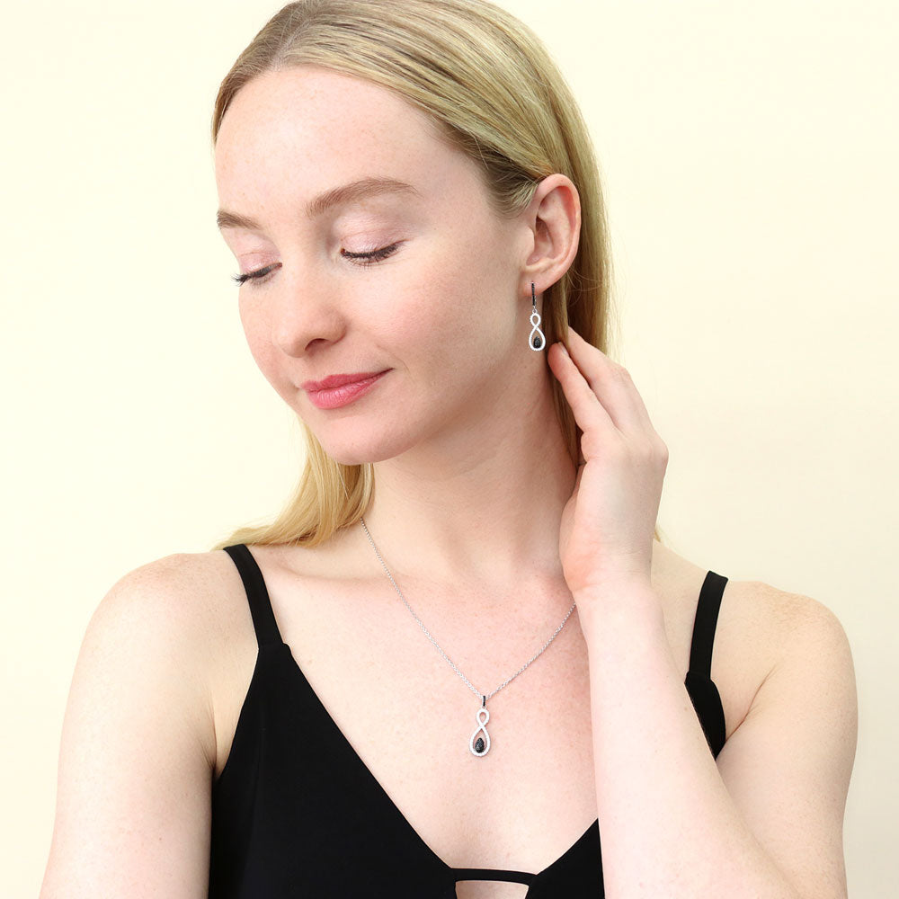 Model wearing Black and White Woven Infinity CZ Set in Sterling Silver, 2 of 14