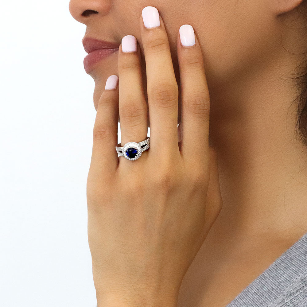 Model wearing Halo Sapphire-Blue CZ Split Shank Ring in Sterling Silver, 2 of 10