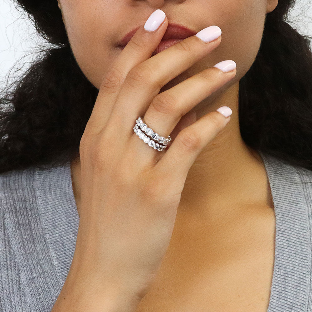 Model wearing East-West Milgrain Bezel Oval CZ Eternity Ring in Sterling Silver, 8 of 9