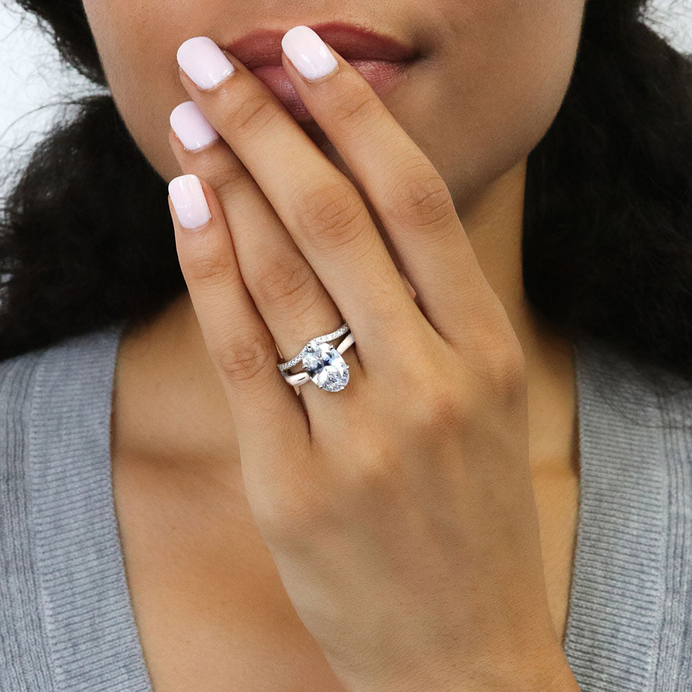Model wearing Solitaire Wishbone 3ct Oval CZ Ring Set in Sterling Silver, 6 of 19
