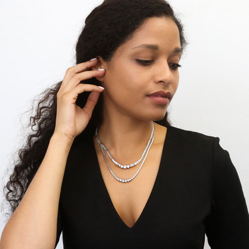 Model wearing Graduated CZ Tennis Necklace in Sterling Silver, 11 of 13