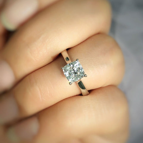 Image Contain: Model Wearing Solitaire Ring