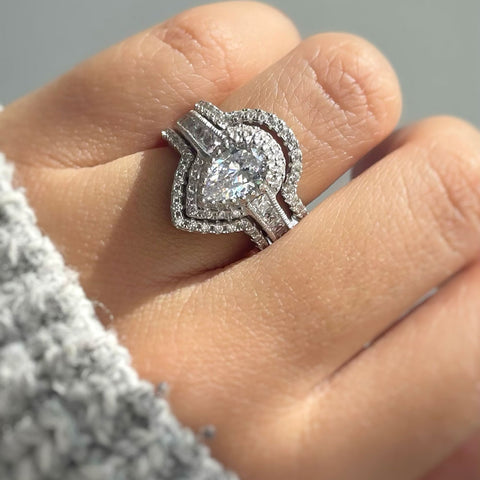 Image Contain: Model Wearing Dome Curved Half Eternity Ring, Halo Ring, Wishbone Curved Half Eternity Ring
