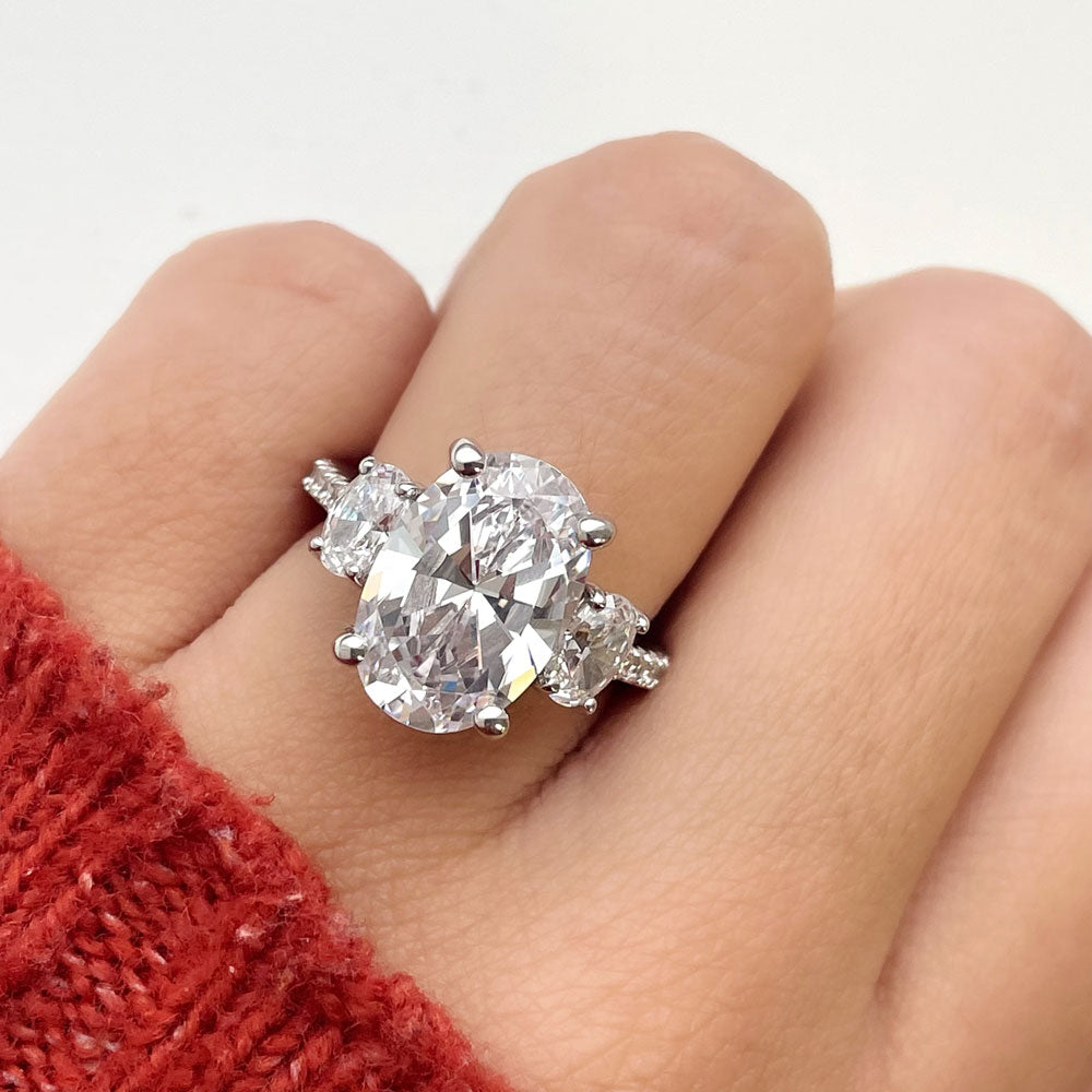 Model wearing 3-Stone 5.5ct Oval CZ Ring Set in Sterling Silver, 11 of 16