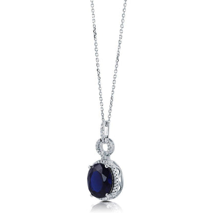 Halo Sapphire-Blue Oval CZ Set in Sterling Silver