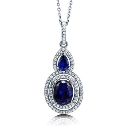 Halo Sapphire-Blue Oval CZ Necklace in Sterling Silver
