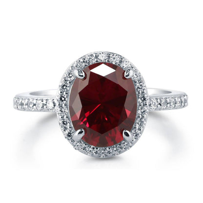 Halo Ruby-Red Oval CZ Ring in Sterling Silver