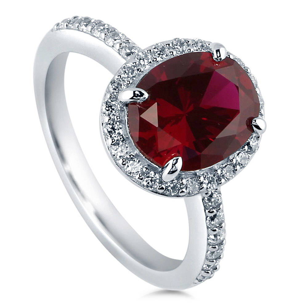 Halo Simulated Ruby Oval CZ Ring in Sterling Silver