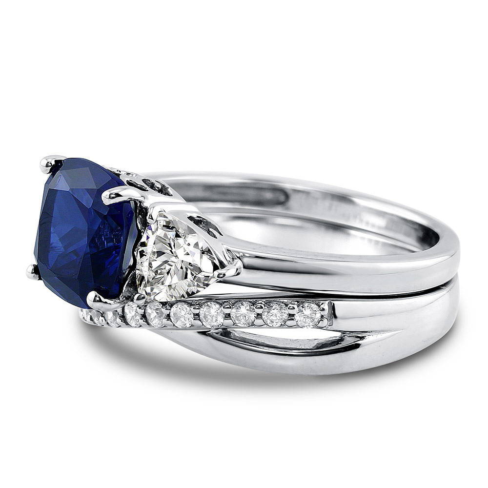 Angle view of 3-Stone Criss Cross Sapphire-Blue CZ Ring Set in Sterling Silver, 5 of 16