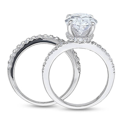 Solitaire Hidden Halo 5.5ct Oval CZ Ring Set in Sterling Silver