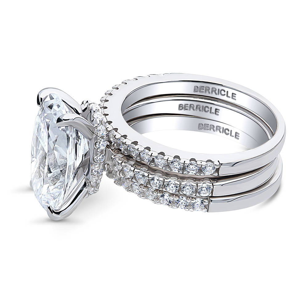 Angle view of Solitaire Hidden Halo 5.5ct Oval CZ Ring Set in Sterling Silver, 5 of 11