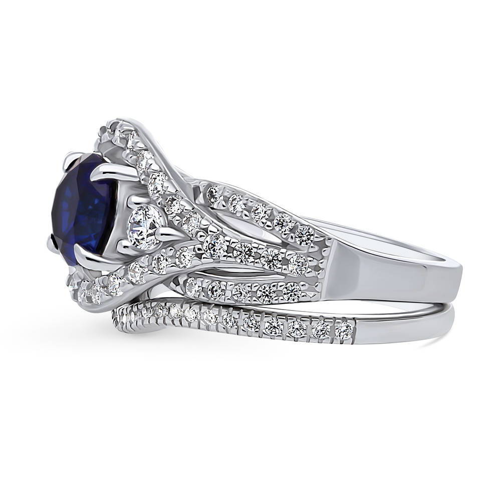 3-Stone Woven Halo Sapphire-Blue CZ Ring Set in Sterling Silver