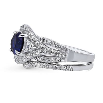 3-Stone Woven Halo Sapphire-Blue CZ Ring Set in Sterling Silver