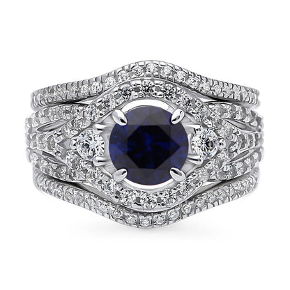 3-Stone Woven Halo Sapphire-Blue CZ Ring Set in Sterling Silver