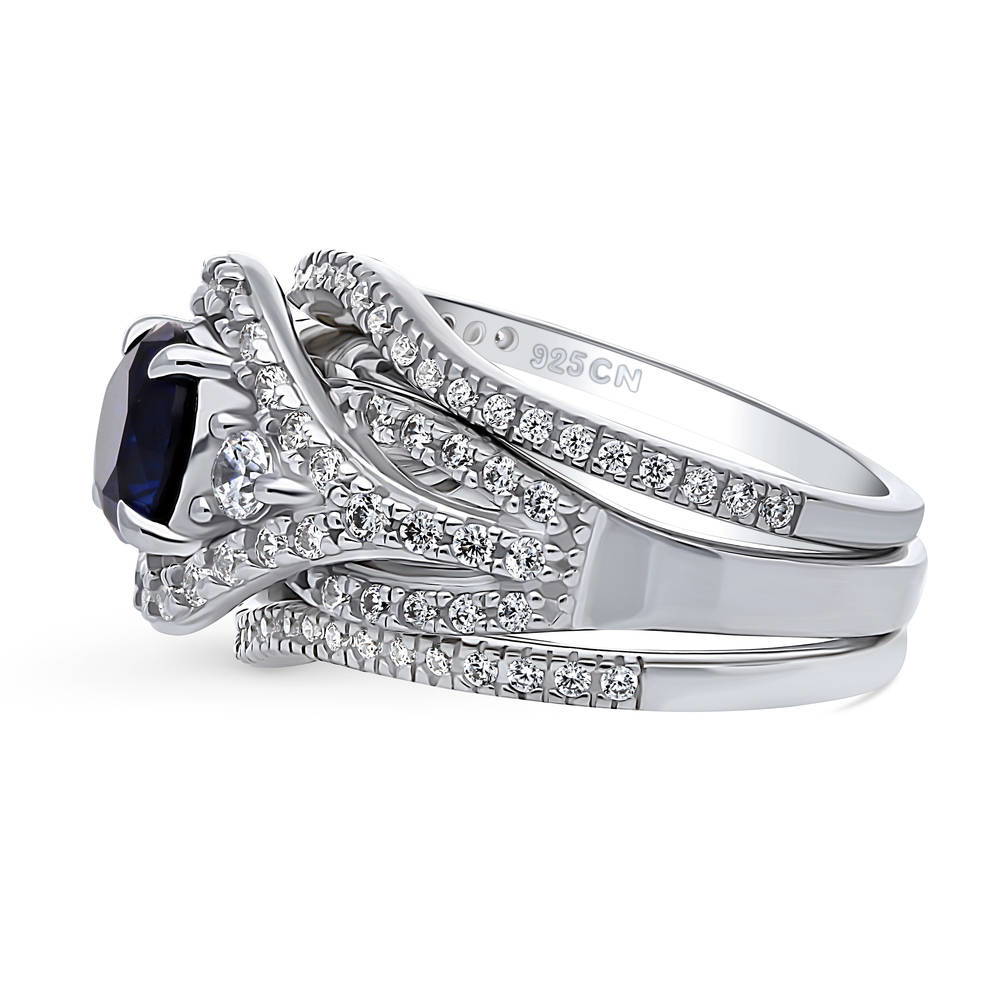 3-Stone Woven Halo Sapphire-Blue CZ Ring Set in Sterling Silver