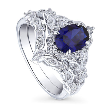 Chevron Halo Simulated Blue Sapphire CZ Ring Set in Sterling Silver