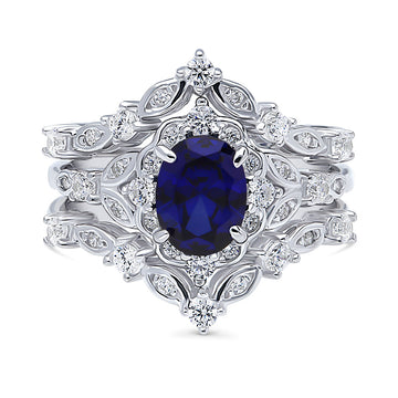 Chevron Halo Simulated Blue Sapphire CZ Ring Set in Sterling Silver